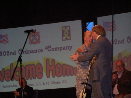 Joey receiving his Challenge Coin